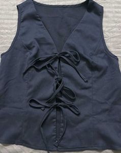 Sleeveless V-Neck Tie-Up Top from savana