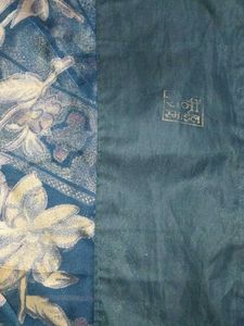 Teal Green Saree with Woven Zari Floral Design