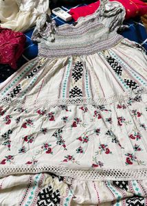 an stylish frock with multiple colours  size xxl
