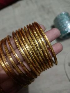 Elegant Gold Tone Bangle Set