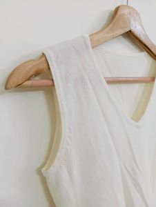 Chic White Sleeveless Top with Floral Embroidery