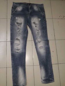 Distressed Blue Denim Jeans