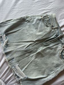 Light Wash Distressed Denim Mini Skirt