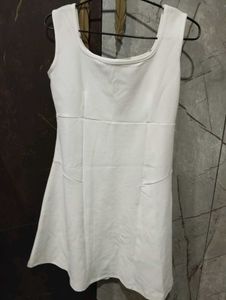 Ribbed Pink Knit Cardigan with White Dress