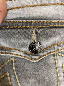 TRUE RELIGION WITH SMALL INK DOT AT BACK