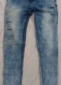 Distressed Light Wash Denim Jeans