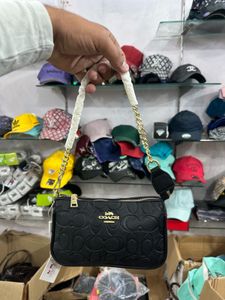 Coach Black Embossed Clutch Bag
