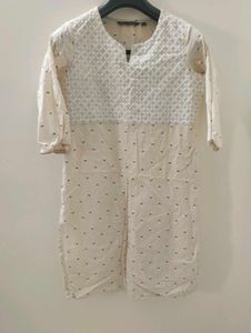 Elegant Cream Kurta with Intricate Embroidery