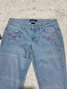 Light Wash Flared Jeans with Embellishments