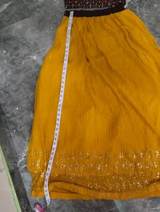 Stunning Yellow Lehenga Choli with Embellished Top