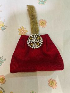 New without tag Elegant Red Clutch with Embellishm