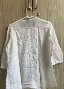 Elegant White Cotton Kurta with Intricate Detailin