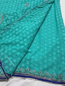 Stunning Teal Saree with Embellished Blouse