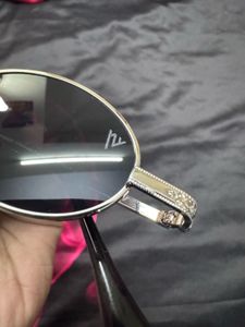 voyage black oval unisex sunglasses