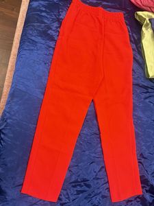 Red Slim Fit Pants with Gold Button Details