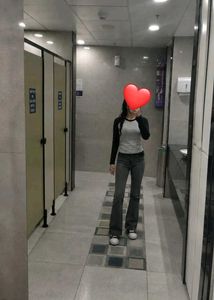 combo of jeans and y2k tee