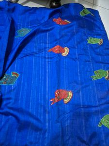 Vibrant Blue Saree with Hand Motifs