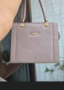 lavender handbag with sling strap