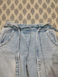 Light Wash Wide Leg Jeans with Embellishments