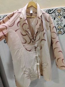 Stylish Beige Blazer with Unique Print