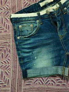 Distressed Denim Shorts