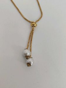 Elegant Gold Watch with Pearl Detail