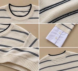 CREAM KNIT STRIPED SWEATER.