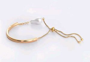 Golden Arc Pearl Slider Bracelet