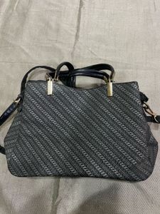 Stylish Textured Handbag with Leaf Charm