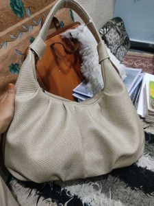 Beige hand beg
