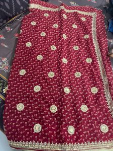 Elegant Maroon Saree with Gold Embroidery