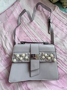 call it spring Stylish lavender sling bag