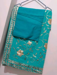 Turquoise Saree with Gold Embroidery