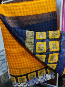 Yellow printed saree with stiched blouse ...