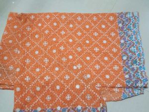 Orange Saree with White Motifs