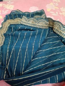 Elegant Teal Saree with Golden Stripes