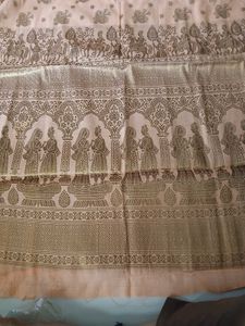 Elegant Peach Saree with Intricate Gold Print