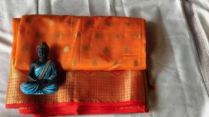 Elegant Orange Silk Saree with Golden Zari