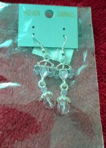 Brand new Elegant Drop Earrings with Purple Stones