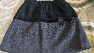 Sparkly Skirt with Bow Accent and fur jacke
