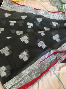 Elegant Black Saree with Silver Motifs
