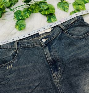 Distressed Wide Leg Denim Jeans