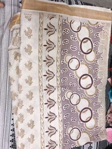Elegant Cream Saree with Paisley Border