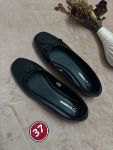 Black Ballerina Flats with Bow Detail