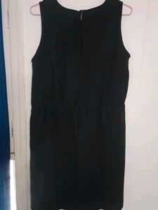 Elegant Black Dress with Embellished Neckline