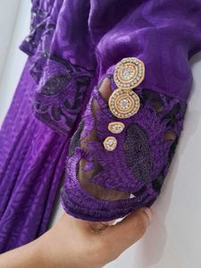 Elegant Purple Brocade Gown with Gold Accents
