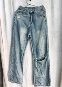 I. Light Wash Ripped Jeans