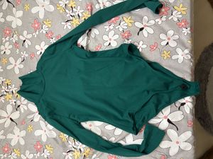 Chic Green Turtleneck Bodysuit