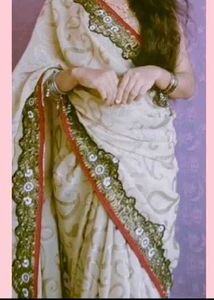 Elegant Cream Saree with Embroidered Border