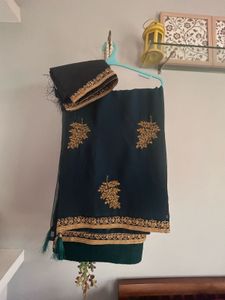 Elegant Teal Saree with Gold Embroidery